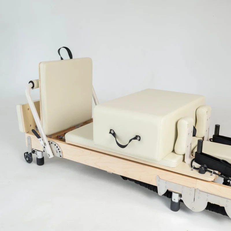 FOLD Reformer Pilates bed in Maple and Beige PU leather accessories