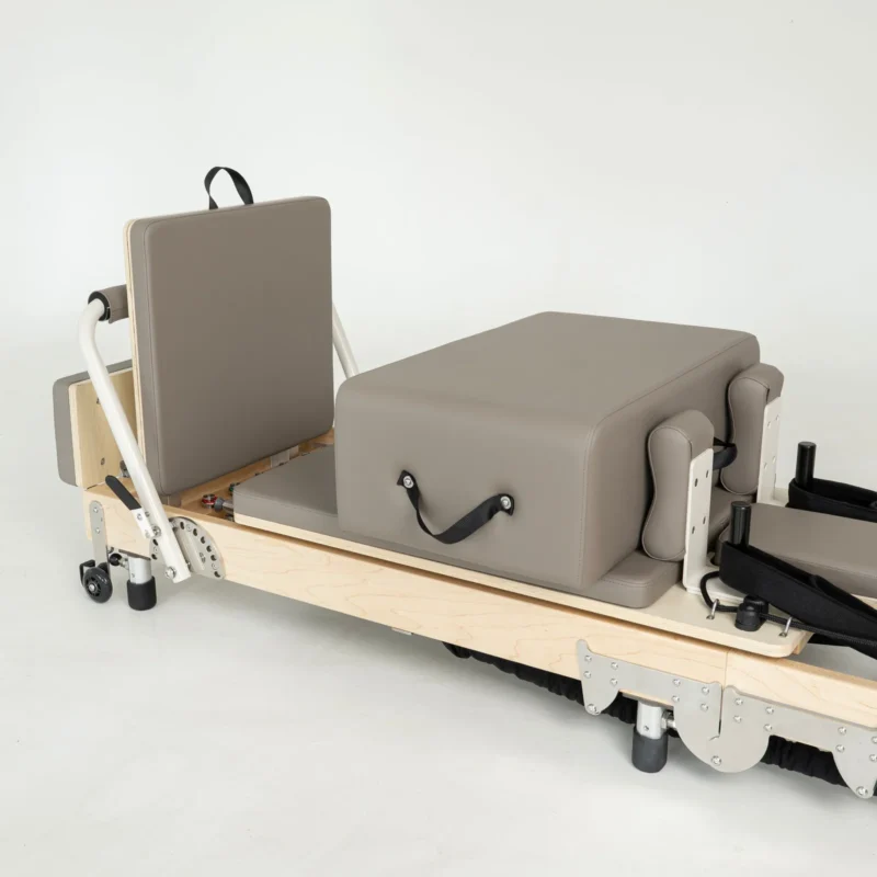FOLD Reformer Pilates bed in Maple and Beige PU leather accessories